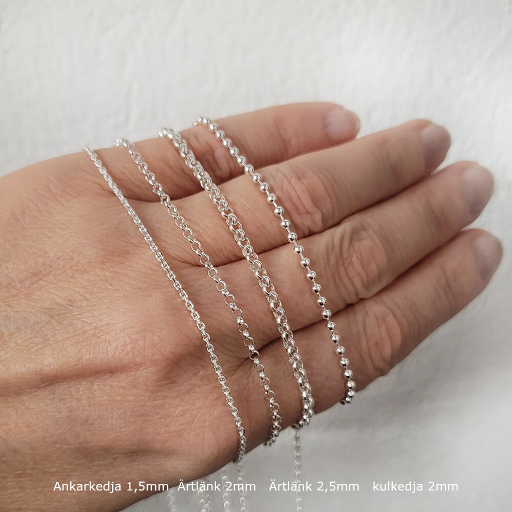 Silverkedjor till dam