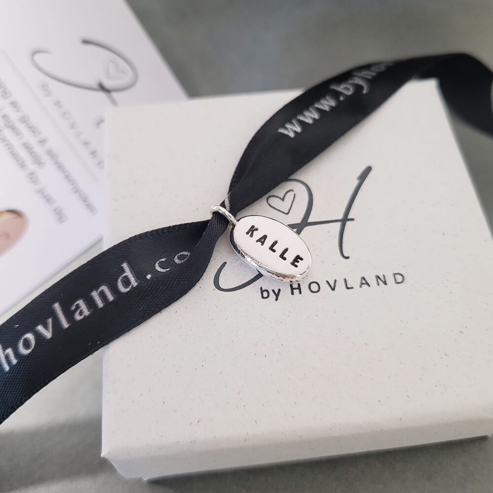 Silverberlock med text tillverkat i sverige